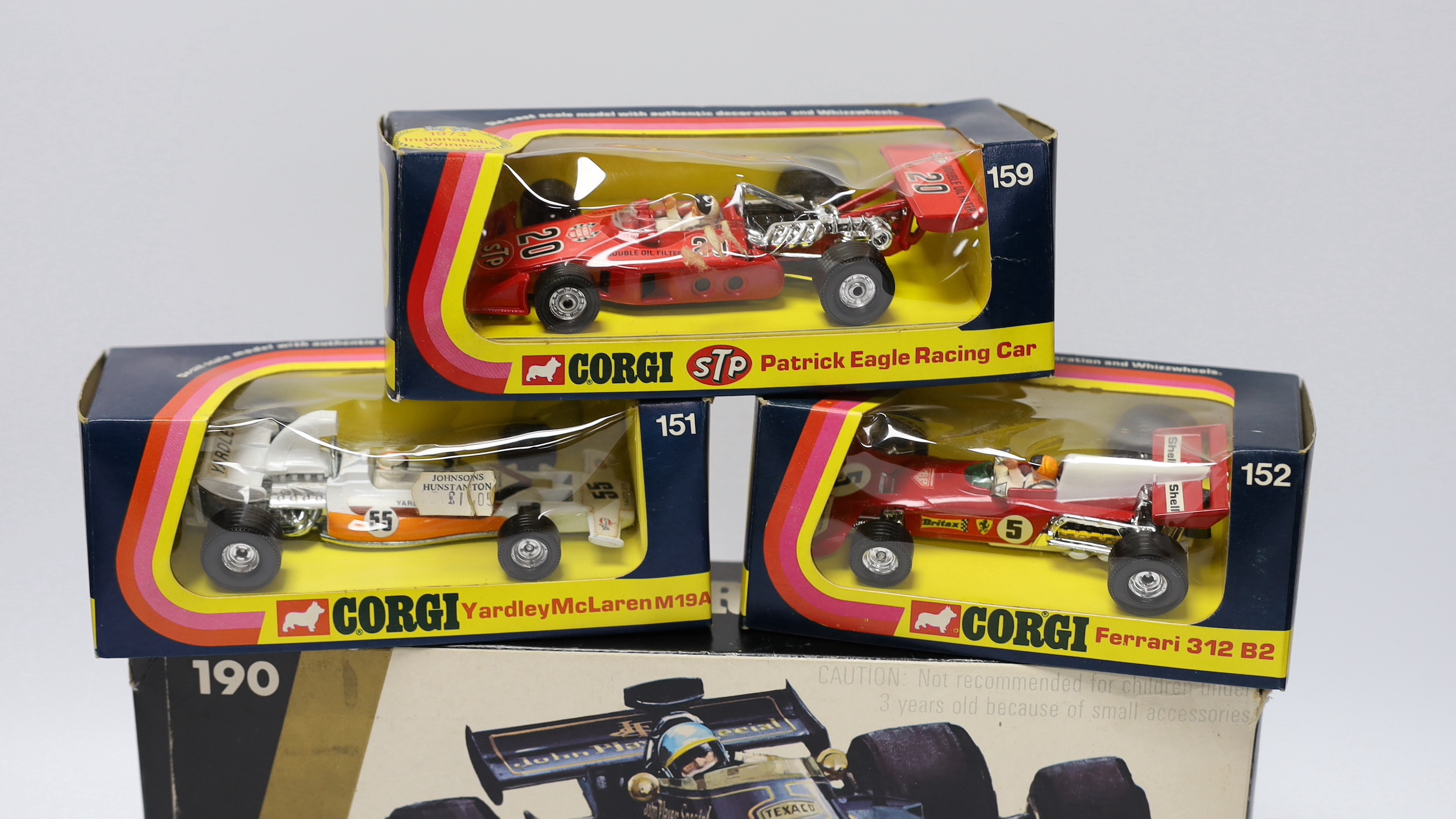 Ten boxed Corgi racing cars